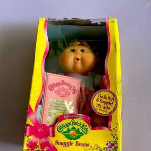 Snuggle cabbage patch in original box never been used soft body age 3 and up.